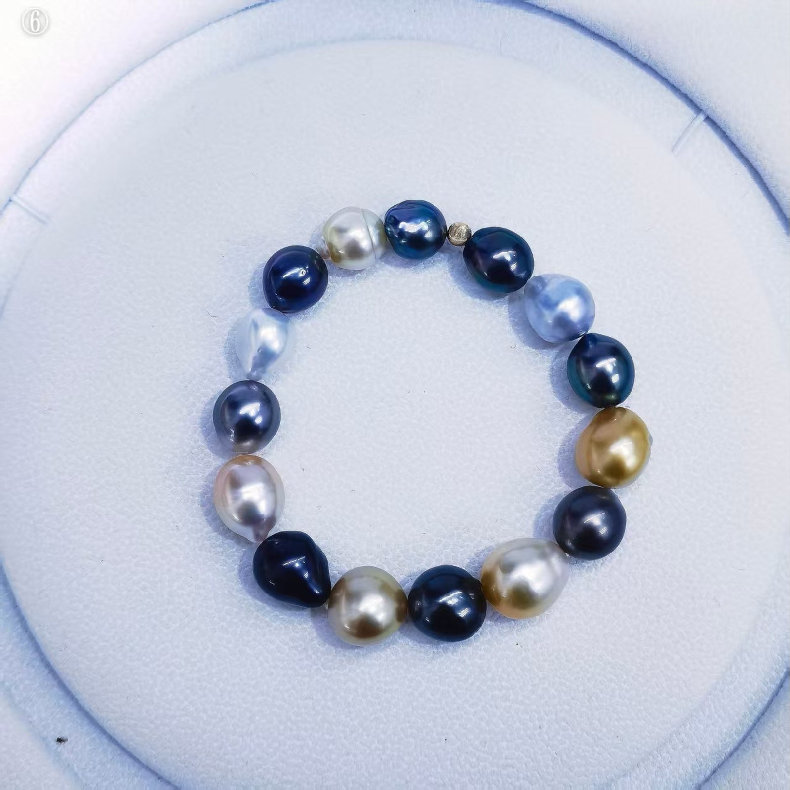 Finished mixed South Sea and Tahitian baroque pearl bracelet with white, golden, and dark pearls