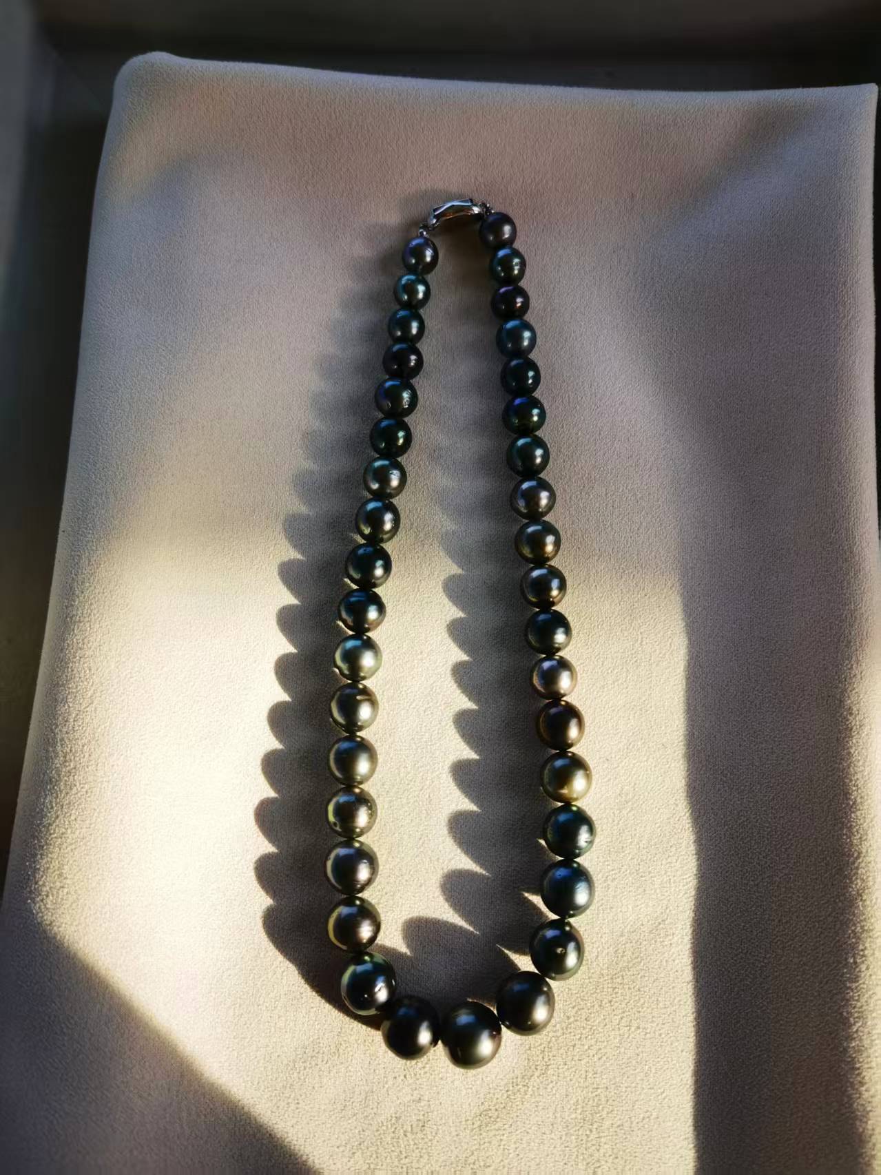 Graduated 9–13mm Tahitian pearl necklace with sterling silver clasp from Moonwater Pearls