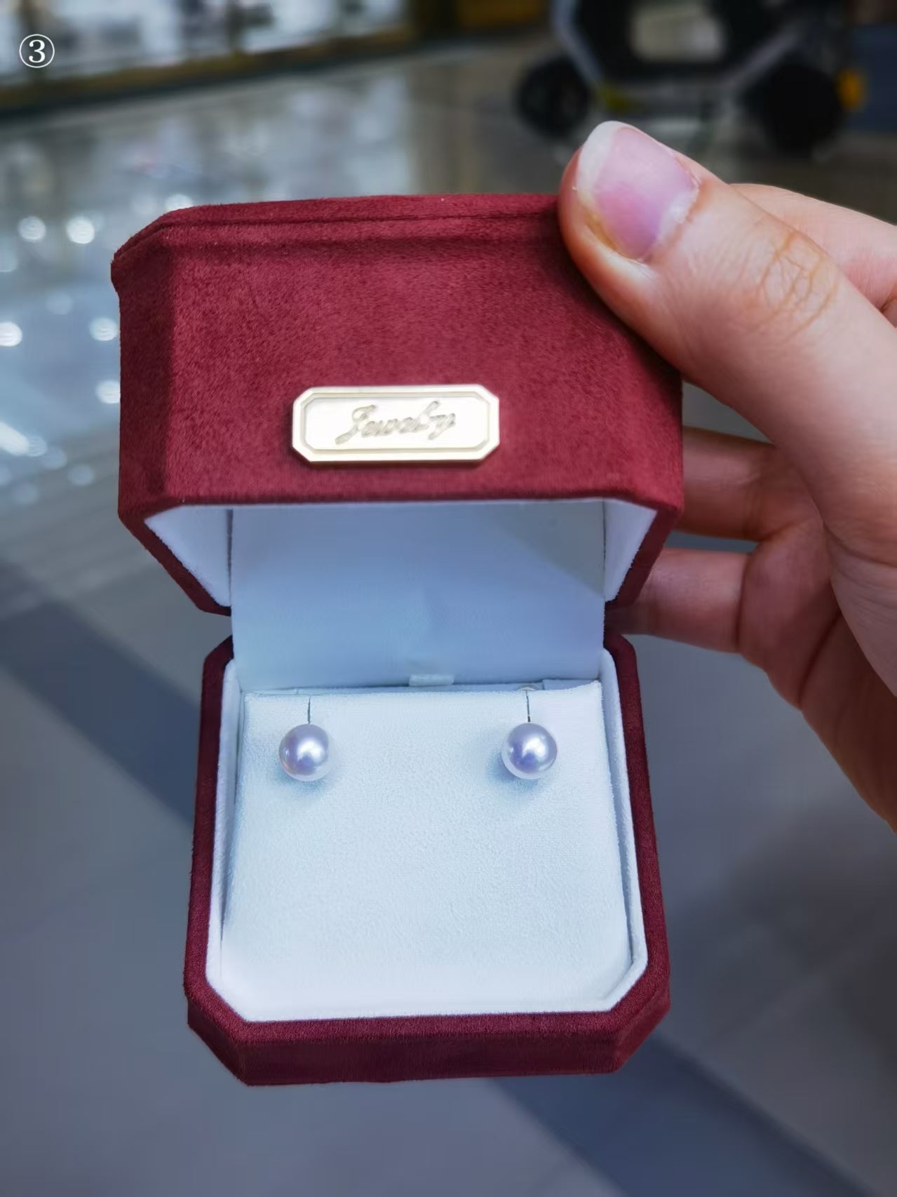 8–9mm white Akoya pearl stud earrings shown in box for scale