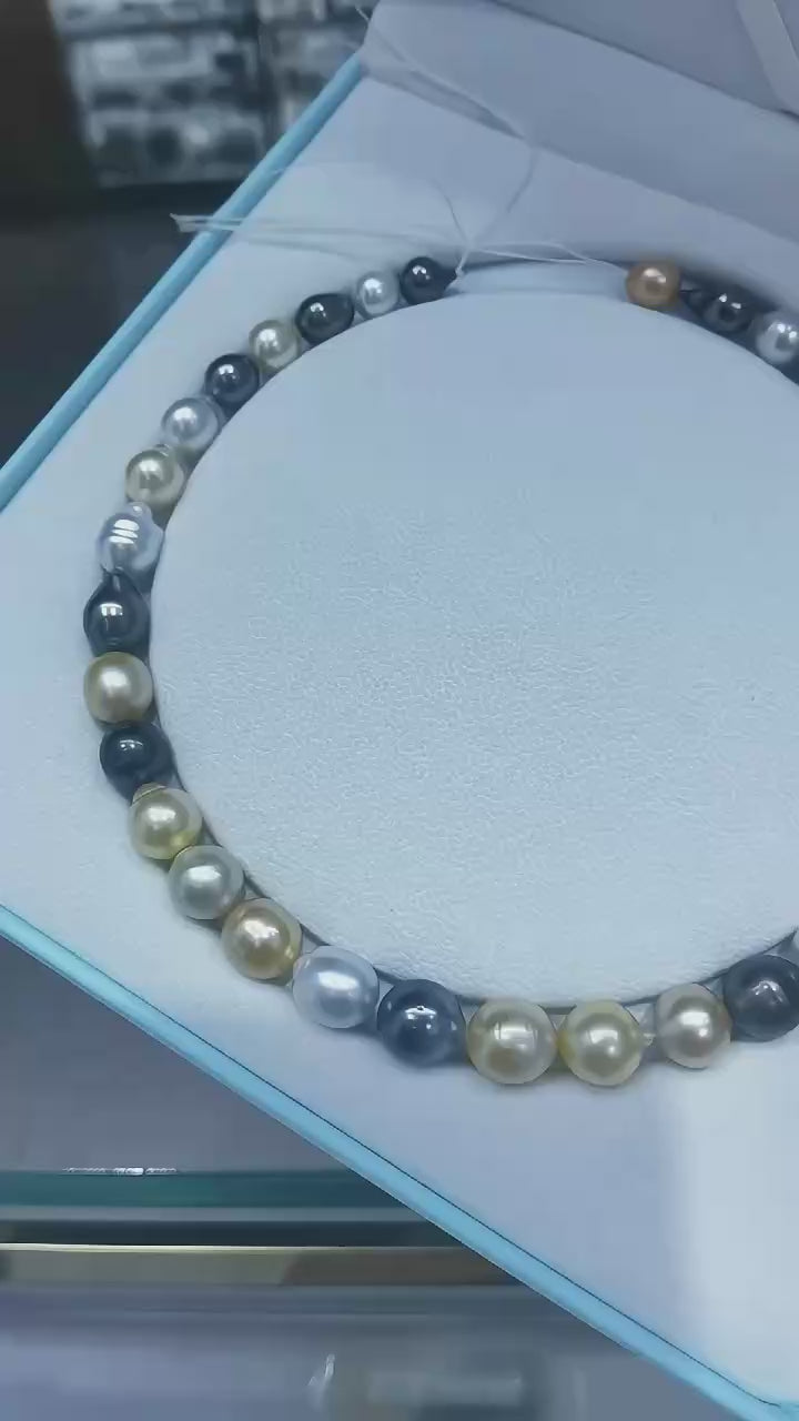 Video of the mixed South Sea and Tahitian baroque pearl strand before final finishing, showing pearl colors, luster, and natural shape variation