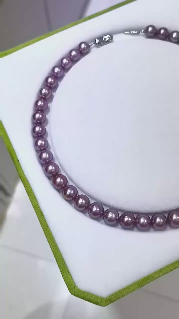 Full view of exact piece natural deep purple Edison freshwater pearl necklace